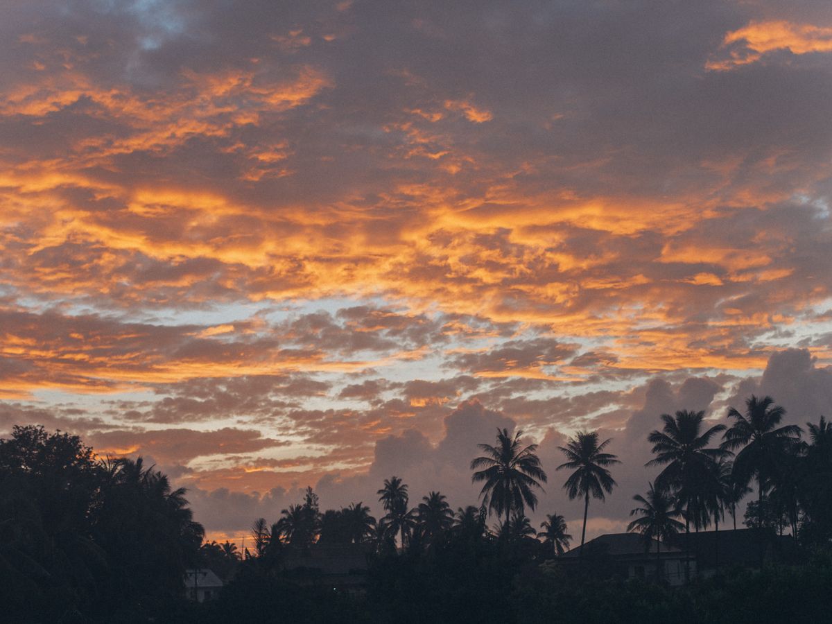 Sunset over the quiet west-leaning coast at Bang Por, Koh Samui