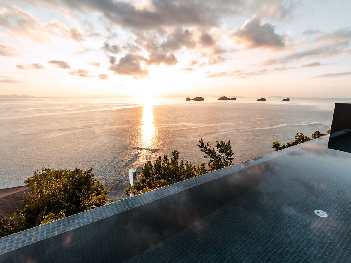 Sunset over an infinity pool on the Plai Laem peninsula, Koh Samui